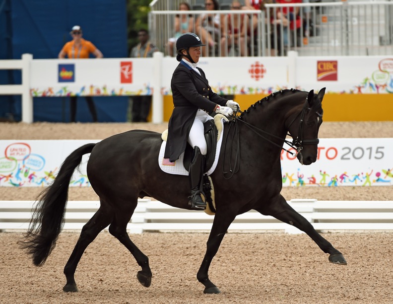 Reno on his way to winning a gold medal. Photo by Allen MacMillan/MacMillan Photography 
