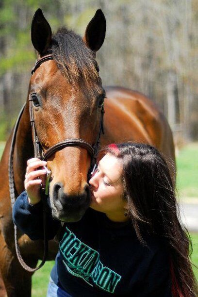 Kimmy and her junior show hunter, and horse of a lifetime, Make My Day. Photo by Danielle Calore