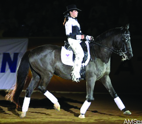 Jeannette Sassoon and her blind dressage horse Valiant performed a moving demonstration at the Reining World Freestyle Championship, part of the Ariat Kentucky Reining Cup, which took part during Rolex in Lexington, Kentucky. (Check out the feature story on Jeannette and Valiant in the June issue of Sidelines). In addition to their demonstrations and upcoming documentary, Jeannette wrote a song for Valiant, “Follow My Heart,” which has been recorded by new country Nashville artist Veronica Taylor. We can’t wait to hear the song on the radio. Photo by Mandy Su – amsphotography.com