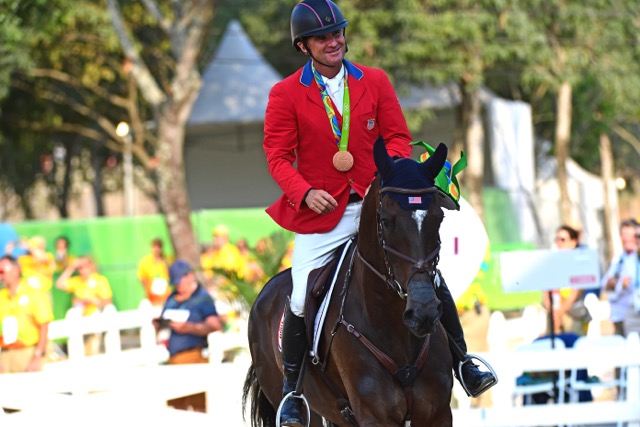 Phillip and Mighty Nice enjoy their Olympic victory gallop. Photo by Kim MacMillan/MacMillan Photography
