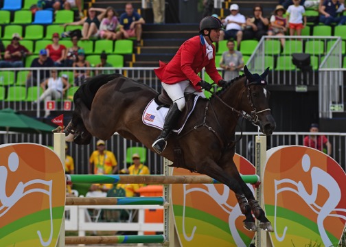 The stadium jumping phase moved Phillip Dutton and Mighty Nice into bronze medal position.  Photo by Allen MacMillan/MacMillan Photography 