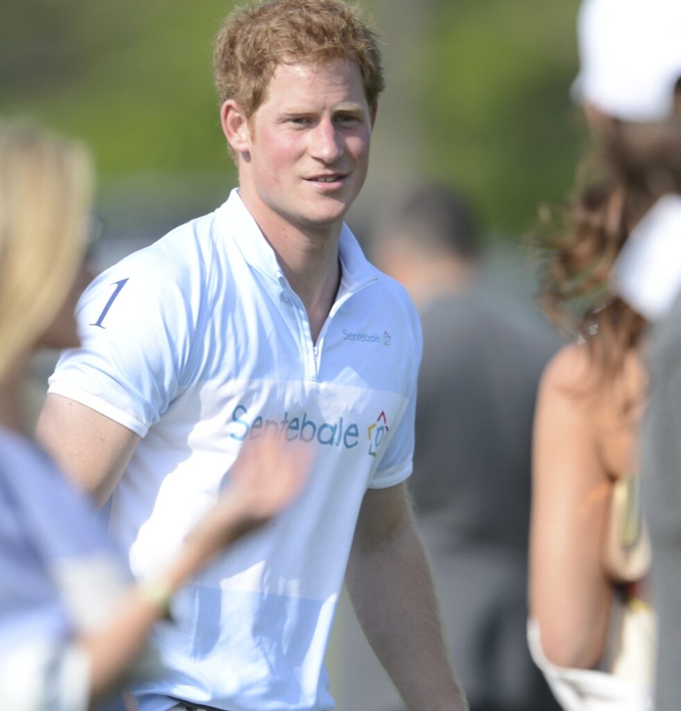 Fans surround Prince Harry, on and off the horse. Photo by John Robben 