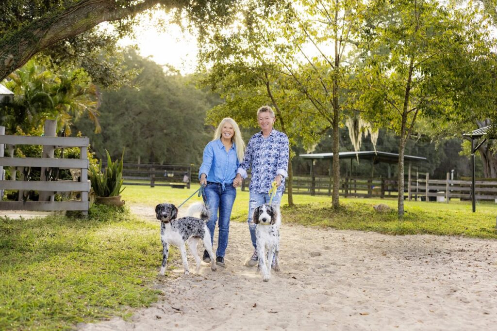 Jennie and her husband, Mike, with their dogs, MiMi and FiFi, MiMi’s mother.