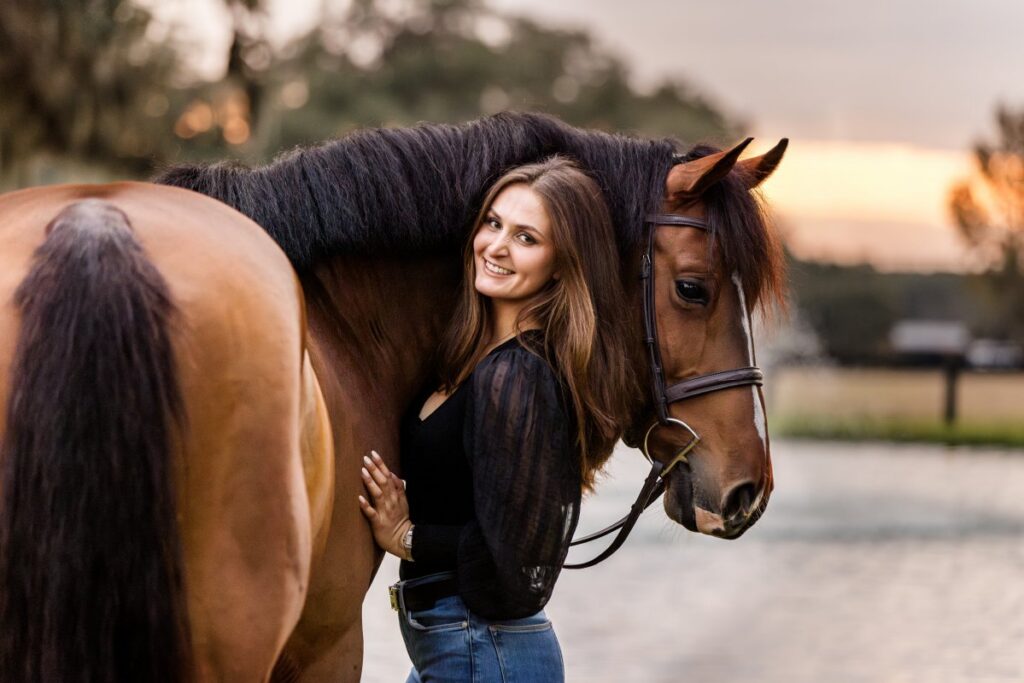 Jodie with her Grand Prix horse, Hendrick Des Forets, owned by JC Equestrian.