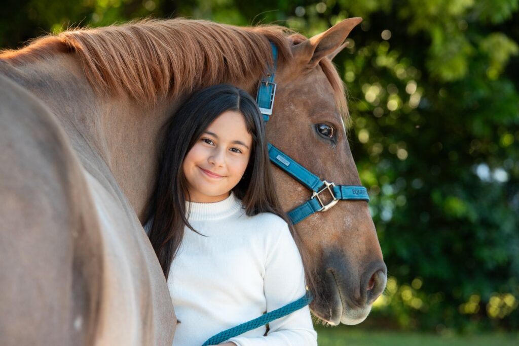 Gabi is 10 years old and is passionate about writing, riding and giving back.
