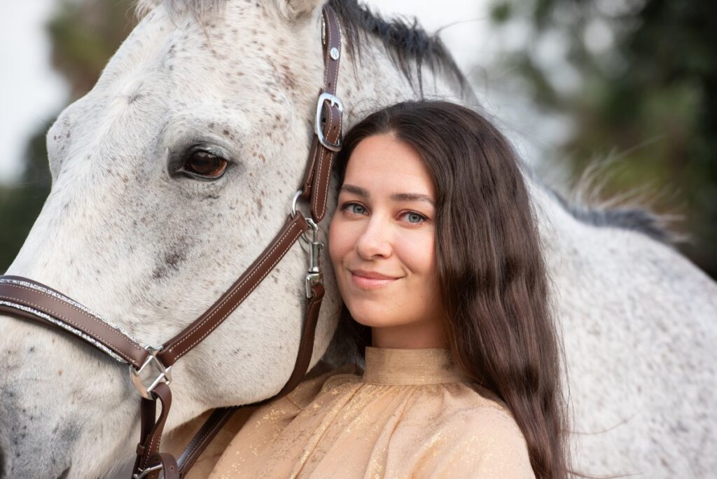 Growing up in Russia, yet was obsessed with horses as early as she can remember.