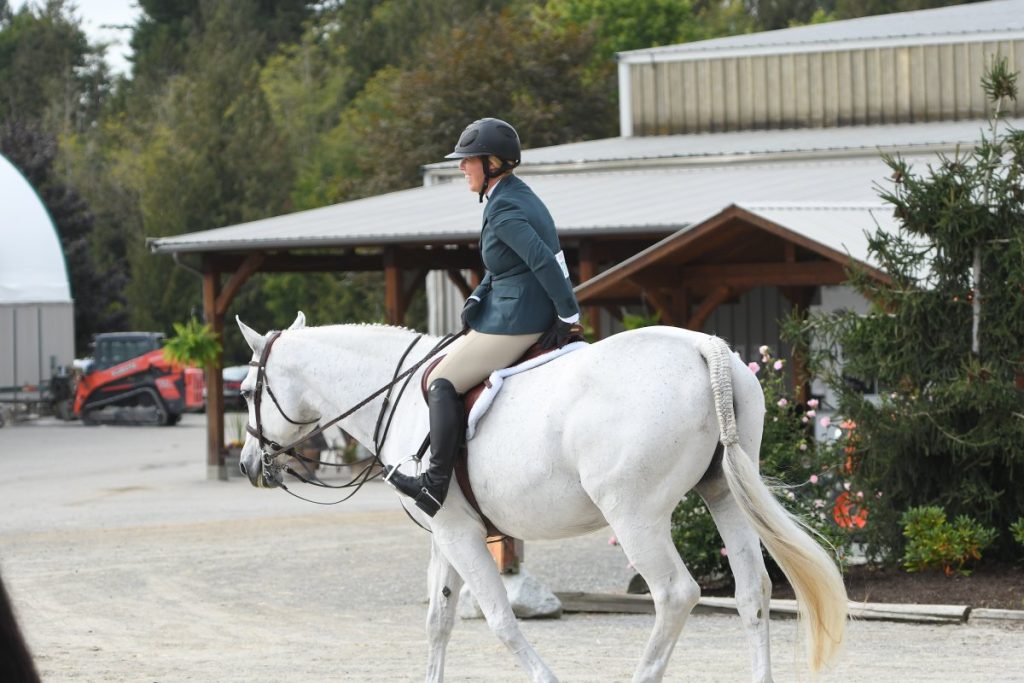Sarah savoring a show moment with Annie.Photo by Totem Photographics