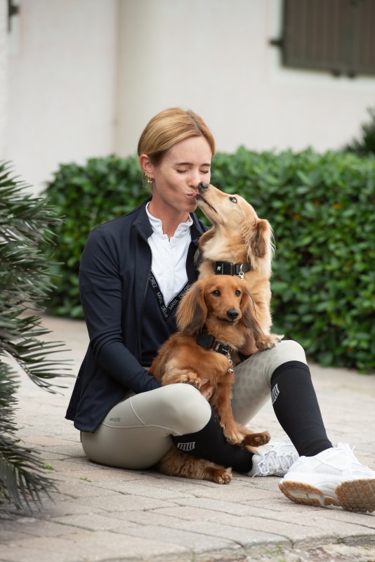 Alise with her dogs, Danger and Toby.