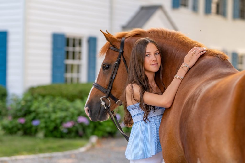 Grace and her pony Prestige were Regular Large Pony and the Overall Grand Pony Hunter National Champions at USEF Pony Finals in 2024.